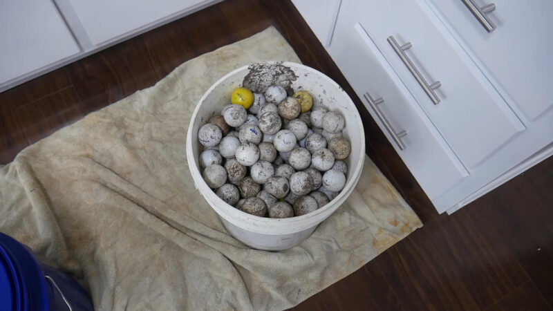 Store golf balls in a bucket